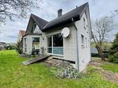 Seitliche Hausanschrift - 3 Zimmer Einfamilienhaus zum Kaufen in Vlotho