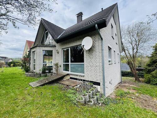 Seitliche Hausanschrift - 3 Zimmer Einfamilienhaus zum Kaufen in Vlotho
