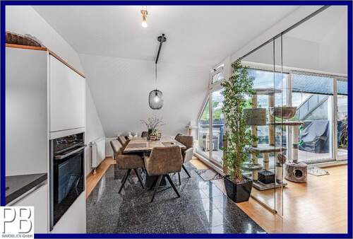 Küche mit Essecke - Vermietungssichere Maisonette-Wohnung in beliebter Lage am Naturschutzgebiet