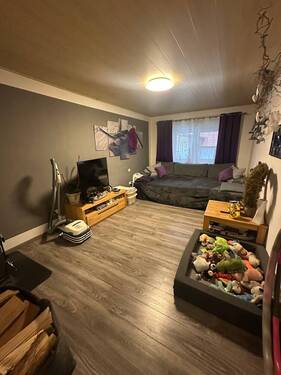 Wohnzimmer (1) - 1 Zimmer Mehrfamilienhaus, Wohnhaus zum Kaufen in Neuhaus am Inn