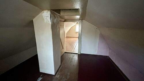 Zimmer im Dachgeschoss - 