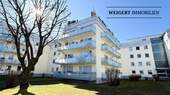 HauptfotoMitLogo - WEIGERT: Gepflegte 3-Zimmer-Wohnung mit 2 Balkonen, XXL-Keller & TG-Stellplatz in Puchheim-Bahnhof
