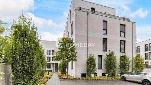 Außenansicht 2 - Exklusivität & Wertsteigerungspotenzial: Vermietete EG-WHG mit Terrasse, TG- & Außenstellplatz