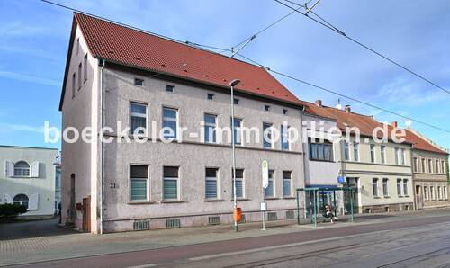 Bild 1 - € 659,26 m² für Wohn- und Geschäftshaus mit stabilen Mieteinnahmen + Steigerungs-Potential