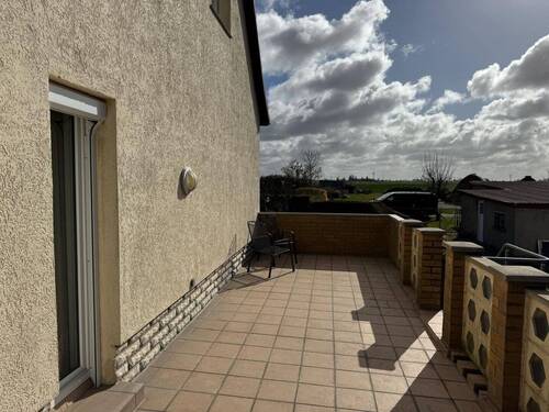 5.) Balkon vom Wohnzimmer aus begehbar + Zugang zum Garten.JPG - 