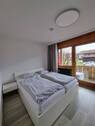 Schlafzimmer mit Balkonzugang - 