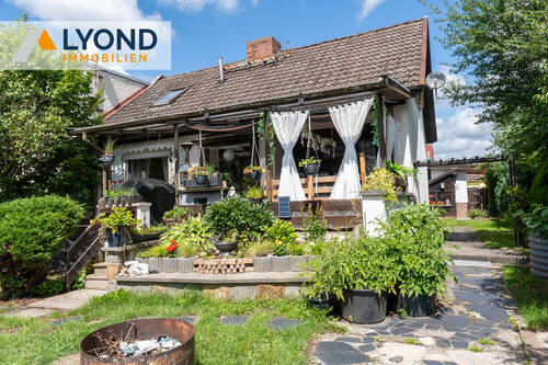 Ansicht vom Garten - Hier zahlen die Mieter ihr Einfamilienhaus ab - EFH mit 2 separaten Wohneinheiten zu verkaufen