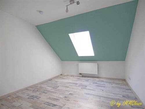 Zimmer im Dachgeschoss - 
