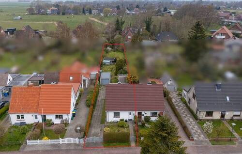 Luftbild - 3 Zimmer Doppelhaushälfte zum Kaufen in Lunden