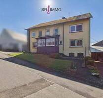 Gepflegtes Wohnhaus mit großen Garagen in ruhiger Lage in Krautscheid