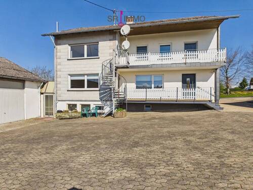 Bild 2 - 8 Zimmer Einfamilienhaus zum Kaufen in Krautscheid