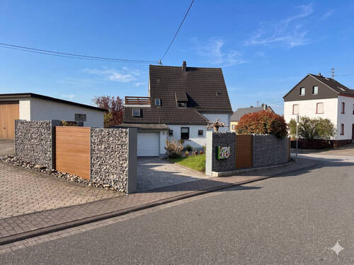 Ansicht Seitenstraße - Reihenendhaus mit 122,00 m&sup2; in Nauort zum Kaufen