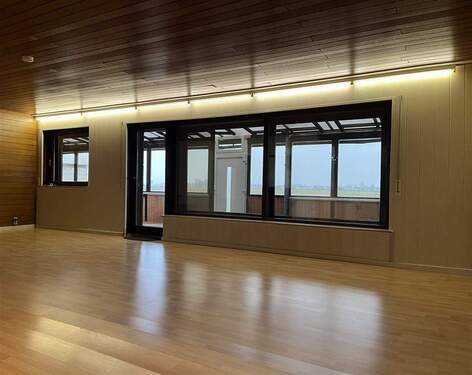 Wohn-und Essbereich mit Blick in Wintergarten - Einfamilienhaus in Rheinmünster zum Kaufen