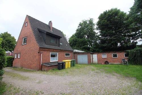 Bild 2 - 6 Zimmer Einfamilienhaus zum Kaufen in Süderlügum