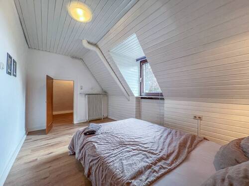Schlafzimmer DG Wohnung 1 - 