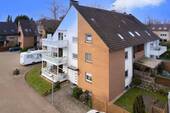 Außenansicht - Charmante 3,5 Zimmer DG-Whg. mit großem Balkon