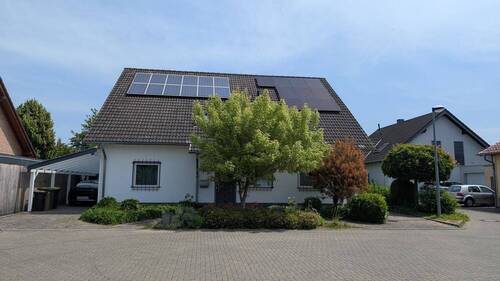 Außen - Hochwertige EG-Wohnung in ruhiger Wohnlage(EBK, 2PKW SP, Kamin, Wintergarten)