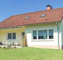 Sehr gepflegter Bungalow mit Vollkeller, Garage und Doppelcarport in ruhiger Wohnlage von Lage-Kachtenhausen