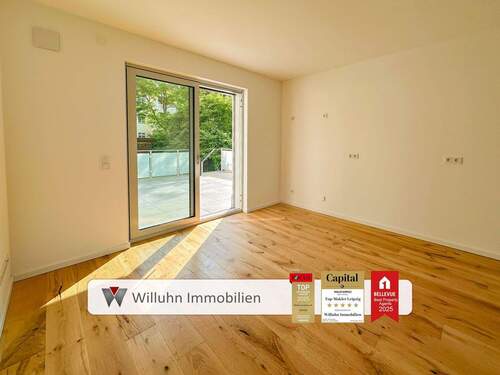 Küche mit Terrassenzugang - Neubauwohnung mit privatem Gartenanteil und ca. 28 m² großer Terrasse - provisionsfrei