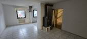 Essbereich mit Ofen - Reihenmittelhaus mit 128,40 m&sup2; in Hemsbach zum Kaufen