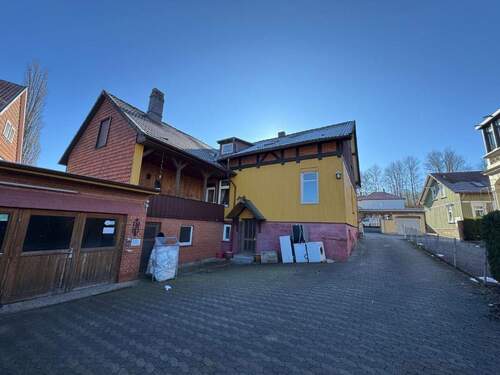 Hausrückseite - Mehrfamilienhaus, Wohnhaus mit 260,00 m² in Bad Gandersheim zum Kaufen