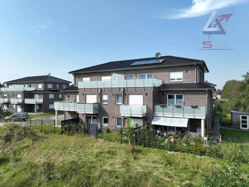 rückwertige Ansicht - Etagenwohnung mit 83,00 m&sup2; in Apen zum Kaufen
