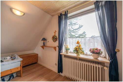 Schlafzimmer 2 im Dachgeschoss - 