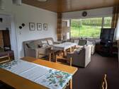 Wohnzimmer - 8 Zimmer Einfamilienhaus zum Kaufen in Hilders-Wickers