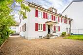 Ansicht West - Mehrfamilienhaus mit 4 freien Wohnungen und Laden in der Stadt