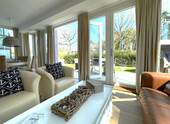 Großer Wohnbereich zur Terrasse - 3 Zimmer Etagenwohnung zum Kaufen in Timmendorfer Strand