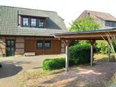 Vorderansicht mit Carport - 4 Zimmer Einfamilienhaus zum Kaufen in Walsrode