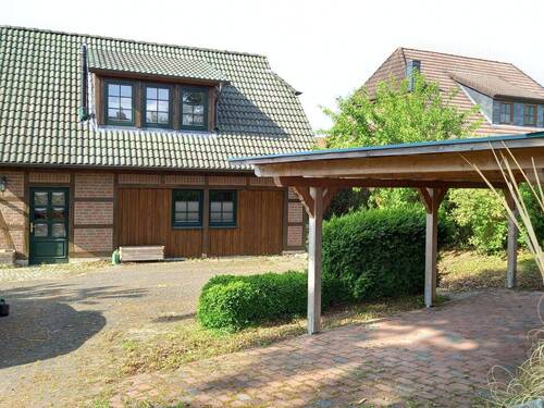 Vorderansicht mit Carport - 4 Zimmer Einfamilienhaus zum Kaufen in Walsrode