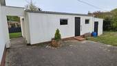 Süd: Garage mit Geräteraum - 