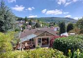 Hausansicht - Außergewöhnliche Penthouse-Eigentumswohnung mit wunderschönem Garten und Saunahaus