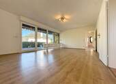Wohnzimmer EG - 7 Zimmer Einfamilienhaus zum Kaufen in Wehrheim
