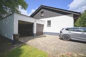 Front-/Seitenansicht - 4 Zimmer Einfamilienhaus zum Kaufen in Loxstedt
