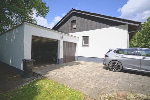 Front-/Seitenansicht - 4 Zimmer Einfamilienhaus zum Kaufen in Loxstedt