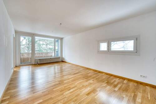 Wohnzimmer - 3 Zimmer Etagenwohnung zum Kaufen in Ottobrunn