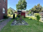 Der Gemeinschaftsgarten mit Gartenhäuschen - 