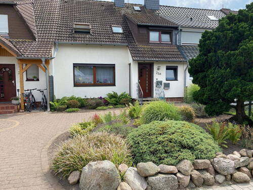 Bild 1 - Großzügiges Reihenmittelhaus mit Garten & Garage in zweiter Reihe am Mittellandkanal
