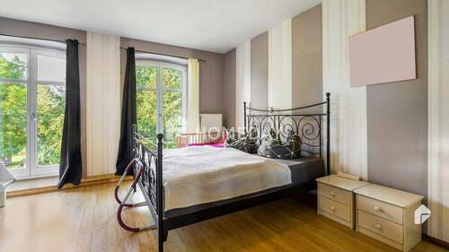 1. OG Schlafzimmer 1 - 