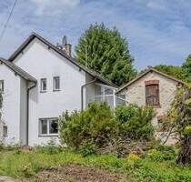 Freistehendes Einfamilienhaus mit großem Grundstück, Doppelgarage & vielseitigem Potenzial in Gründau