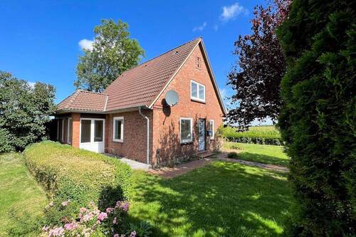 Außenansicht mit Terrasse - 5 Zimmer Einfamilienhaus zum Kaufen in Risum-Lindholm