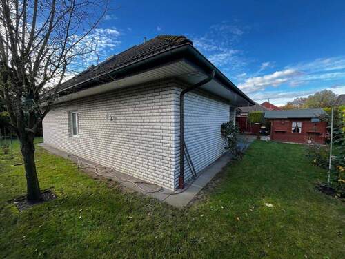 Seitenansicht 2 - Einfamilienhaus mit 141,90 m² in Saterland zum Kaufen