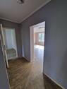 Flur -Blick ins Wo.Zi. + Schlafzi..jpg - 