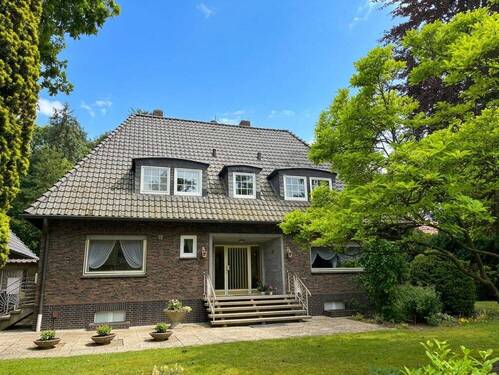 Straßenansicht (KI-optimiert) - Einfamilienhaus mit 188,00 m&sup2; in Hemsloh zum Kaufen