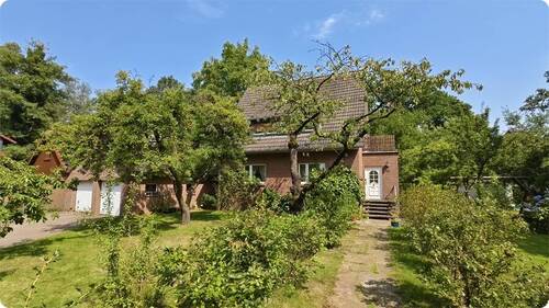 Vorgarten - Mehrfamilienhaus, Wohnhaus mit 219,00 m&sup2; in Nienhagen zum Kaufen