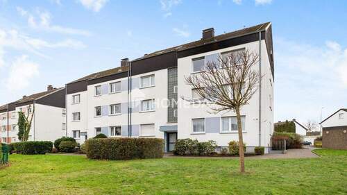 Außenansicht 6 - Ideal geschnittene 2-Zimmer-Wohnung mit Loggia und Garage in gepflegtem Mehrfamilienhaus