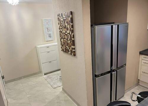 Übergang Eingang zu Küche - Reihenmittelhaus mit 170,00 m&sup2; in Egelsbach zum Kaufen