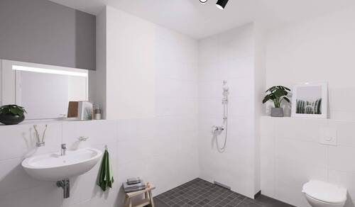 Ein modern gefliestes Badezimmer mit bodengleicher - 